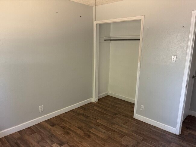 Building Photo - Welcome to this beautiful 4-bedroom, 2-bat...