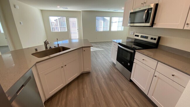 Building Photo - 2 Bedroom NEW Townhouse with Mountain Views close to the VA Hospital in North Las Vegas.