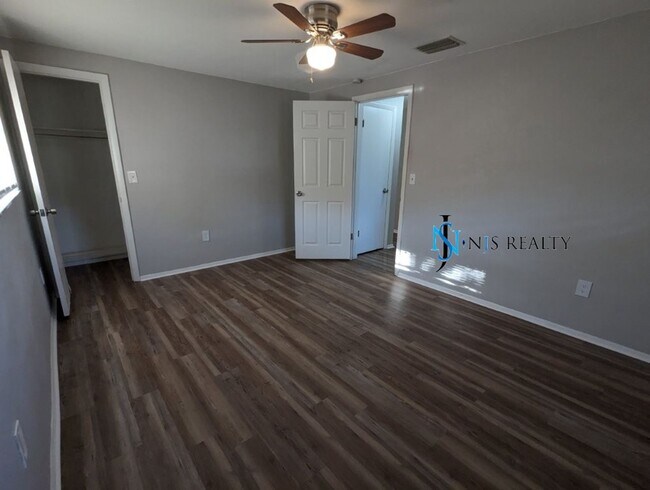 Building Photo - Just Reduced!  2/2/1 with  RENOVATED baths & kitchen, fenced yard, NEW lvp flooring and a OVERSIZ...