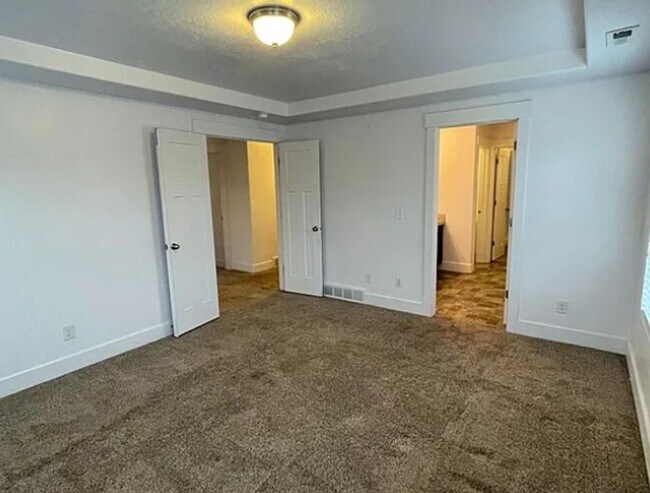Building Photo - Spacious 4-Bedroom Home with Finished Basement in Taylorsville