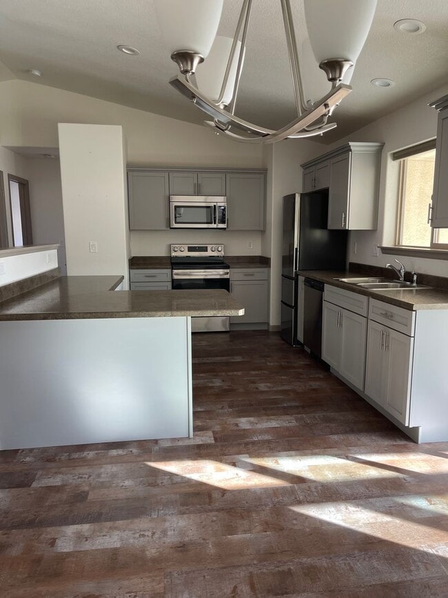 Building Photo - 3 Bedroom 2 Bath With a 2 car garage