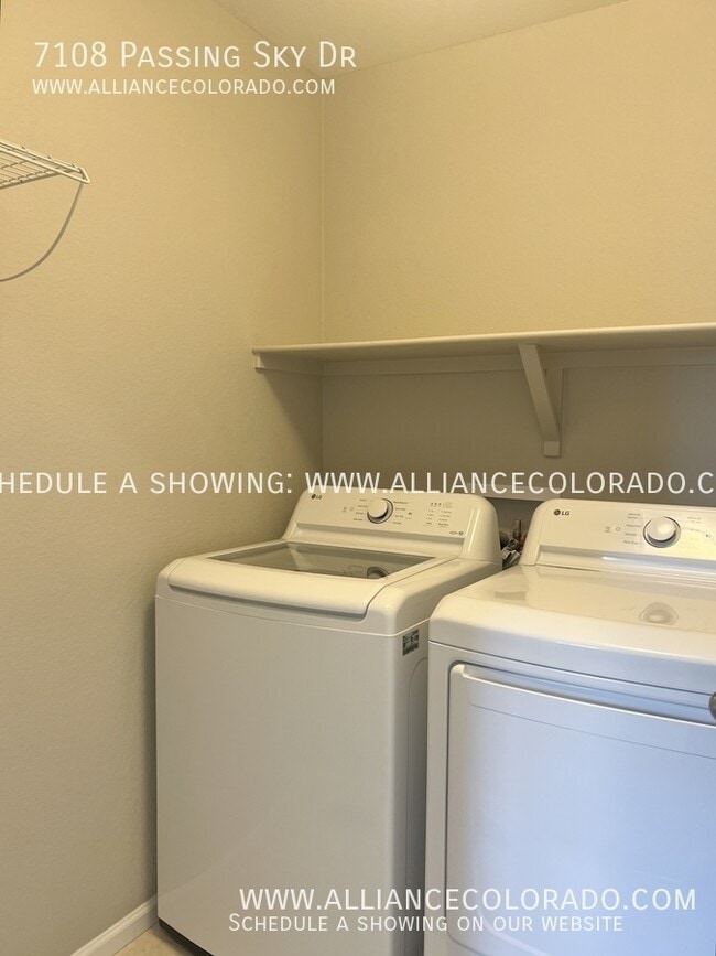 Building Photo - 7108 Passing Sky Dr