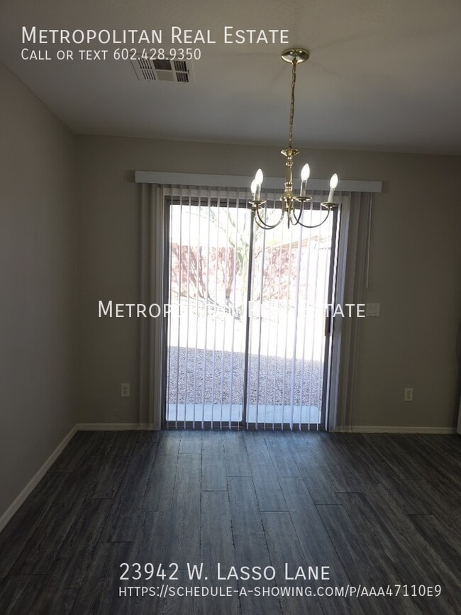 Building Photo - 23942 W Lasso Ln