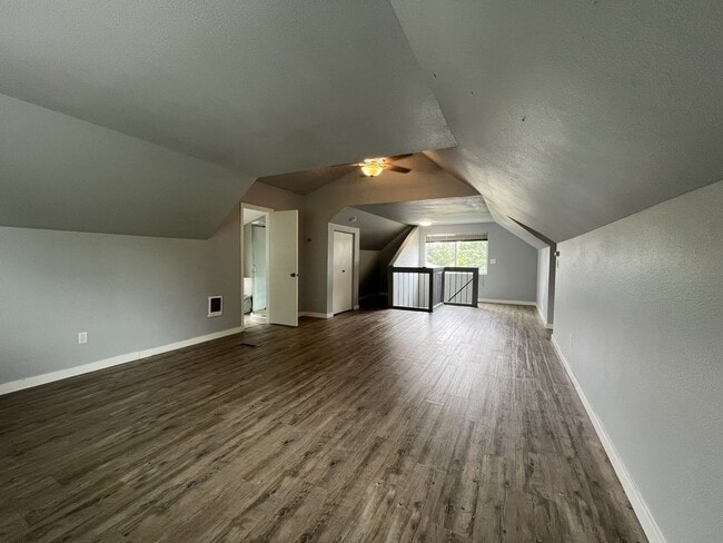 Building Photo - Three-Bedroom Home with Updated Kitchen & Vaulted Ceilings