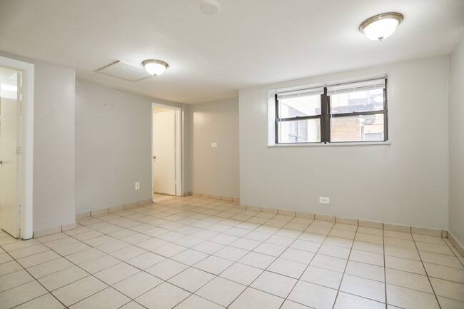 Building Photo - 1658 W Pratt Blvd