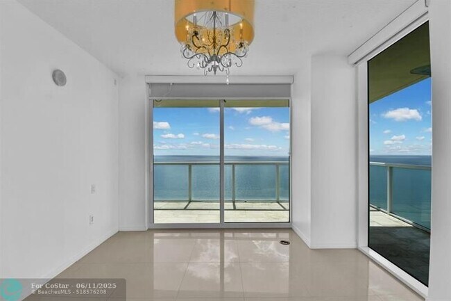 Building Photo - 16699 Collins Ave