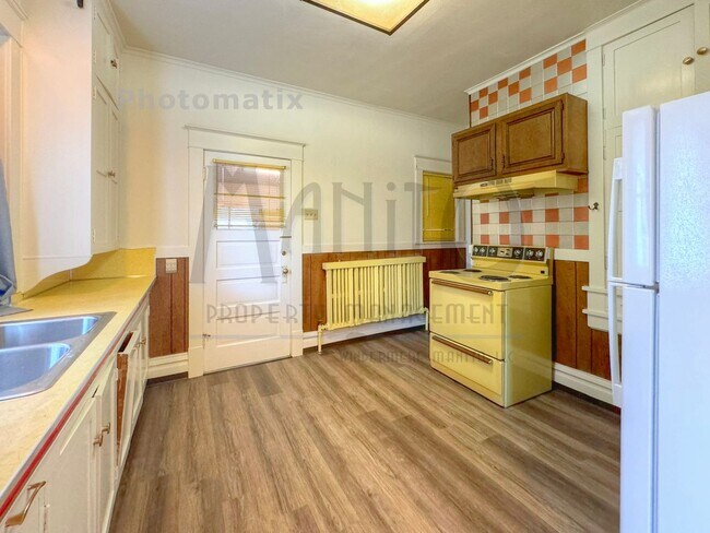 Building Photo - 602 E 23rd Ave