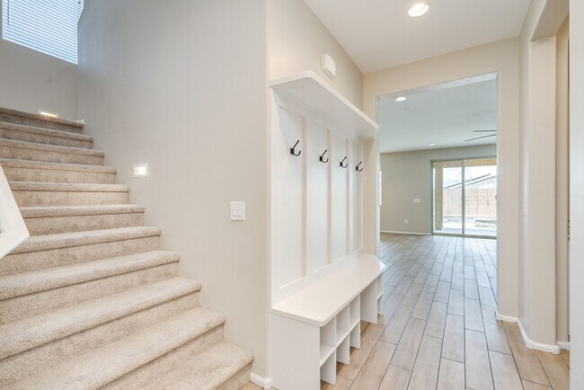 Building Photo - Amazing 4BR 2.5BA Home w/ 3-Car Tandem Garage • Pool Access • Yard w/ Fire Pit in Saguaro Trails