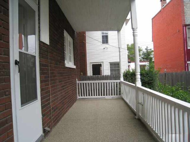 Building Photo - 3 BR Home with Natural Light, Covered Porches & Bonus Sunroom