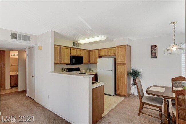 Building Photo - 5710 E Tropicana Ave