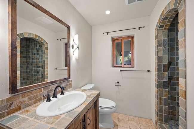 Building Photo - This Beautiful Hacienda Style Home combine...