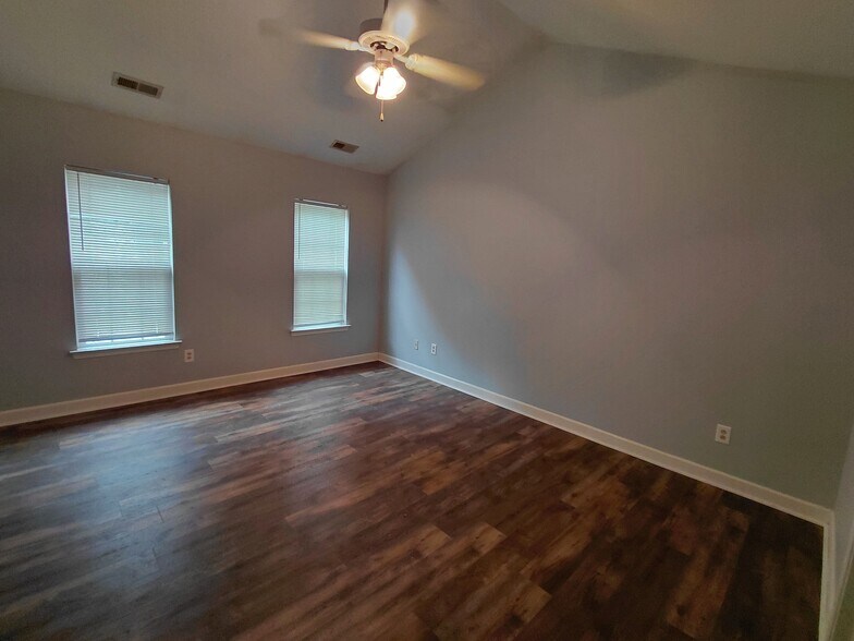 Vaulted Main bedroom new paint and new flooring - 5043 Wheat Dr SW