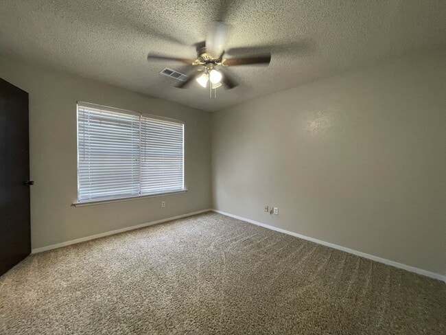 Building Photo - Spacious Snyder Home: 3 Beds, 2 Baths, 2-Car Garage & Cozy Carpeted Bedrooms!