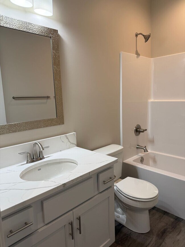 Building Photo - Beautiful brand-new ranch townhome with 2 stall garage. Spacious 3 bedrooms/3 full bathrooms