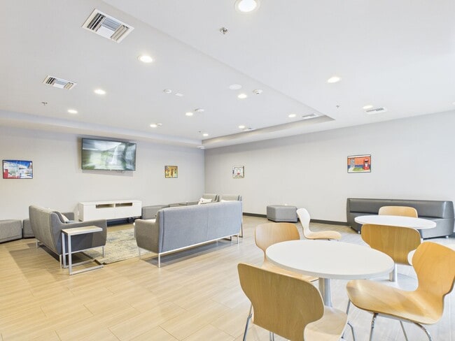 Building Photo - Modern East Austin Condo with City Views & Unmatched Walkability