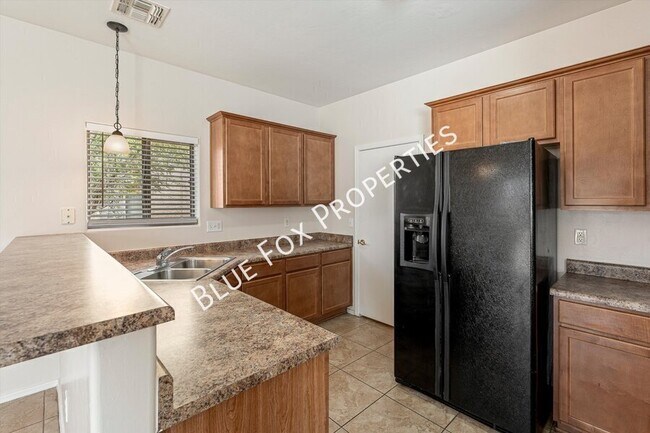 Building Photo - 8277 W Zlacket Dr