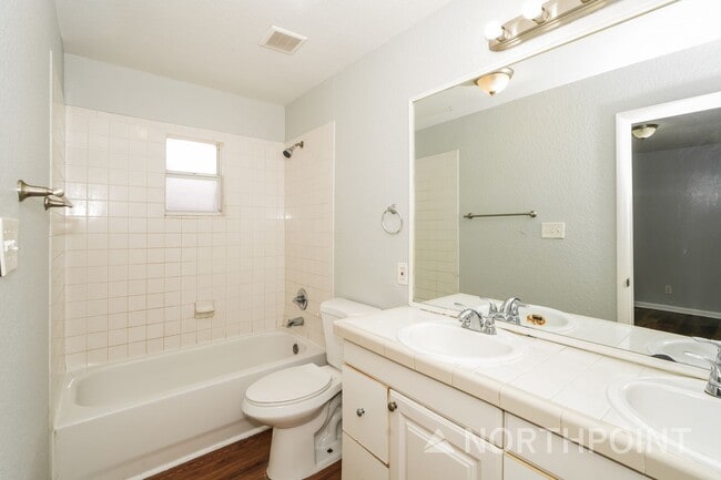 Building Photo - Newly Renovated Single Family Home | 4 BR/2BA | Partially fenced  front yard