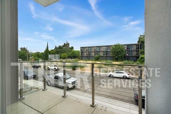 Building Photo - Elegant Modern Living