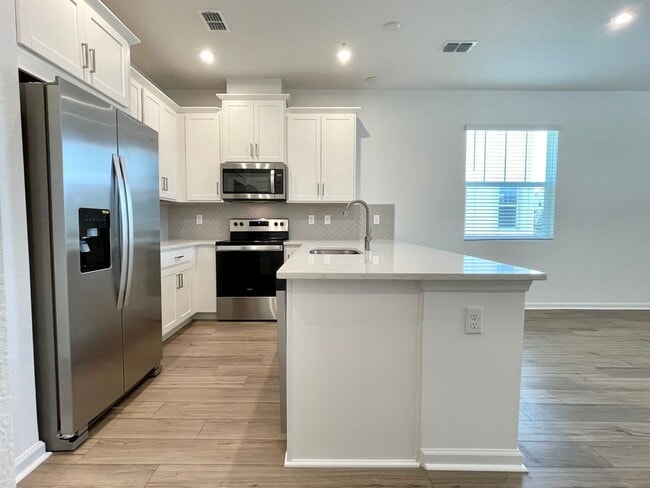 Building Photo - Newer 4 Bedroom, 2.5 Bath Corner Unit Town...