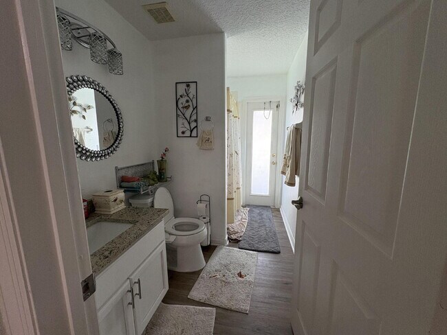 Building Photo - Spacious 4-Bedroom Oasis with 3 Full Baths in the Beautiful Community of Indian Lakes in St. Clou...