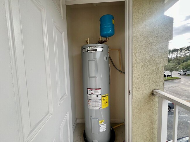 Building Photo - Gated Comfort Condo, Poolside Vibes: Your Next Home Awaits at Merrill Pines