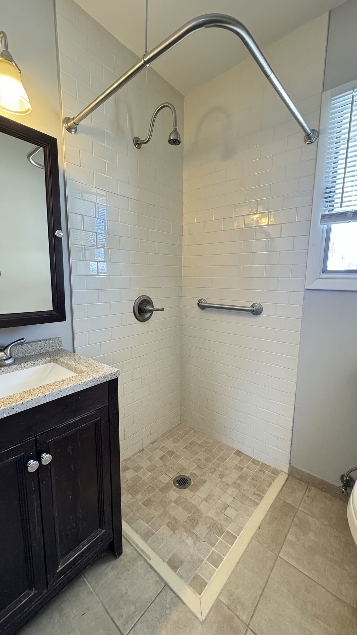 The European style shower is easy for people that need to be able to sit or use a wheelchair - Neffsville Cottages