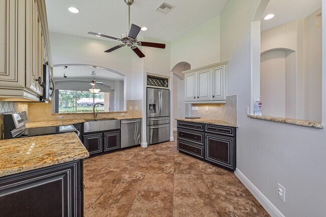 Building Photo - ** Immaculate,  3 Bed/2 Bath Lake Front Pool Home in Naples ~ Available NOW**