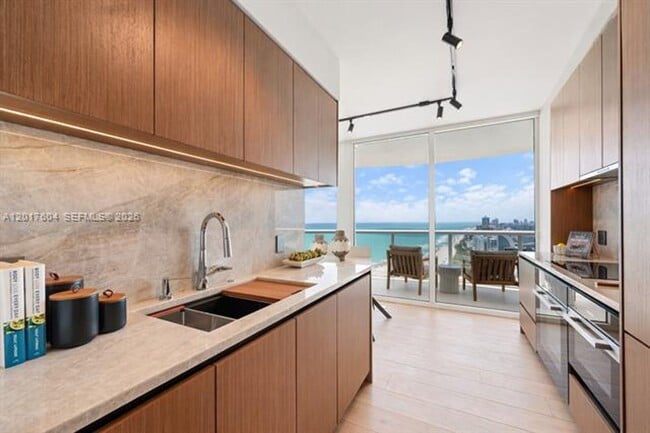 Building Photo - 6365 Collins Ave