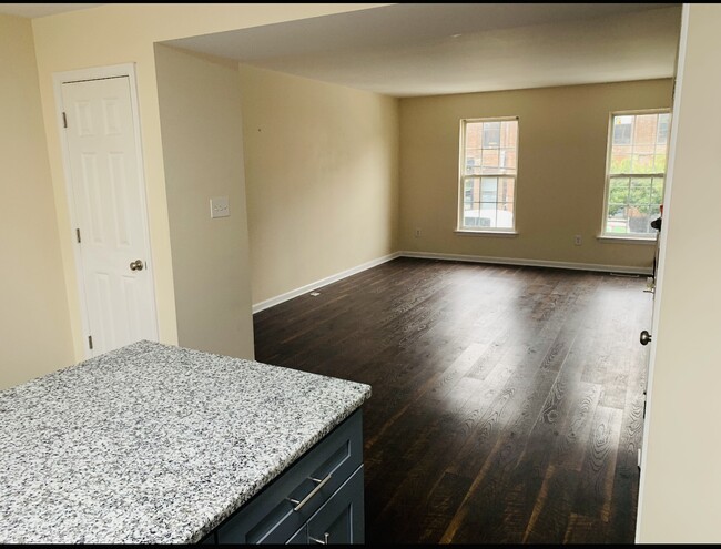 Kitchen 3 looking into Living Room - 2419 E York St