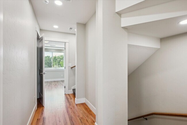 Building Photo - Modern 4-Bedroom Townhome with Rooftop Deck Near Sloan’s Lake & Light Rail