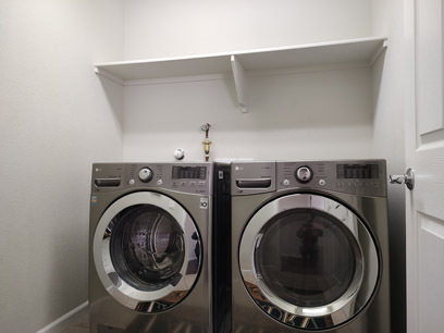 Laundry room with washer and dryer - 3544 Plano Vista Rd NE