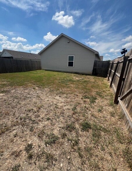 Building Photo - 7002 Cozy Run