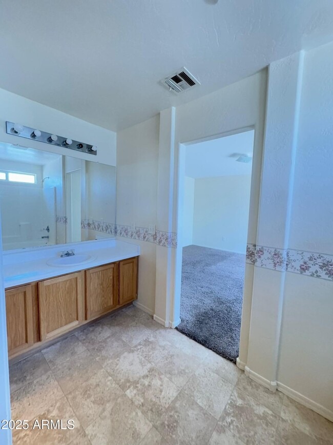 Building Photo - 7207 N 69th Dr
