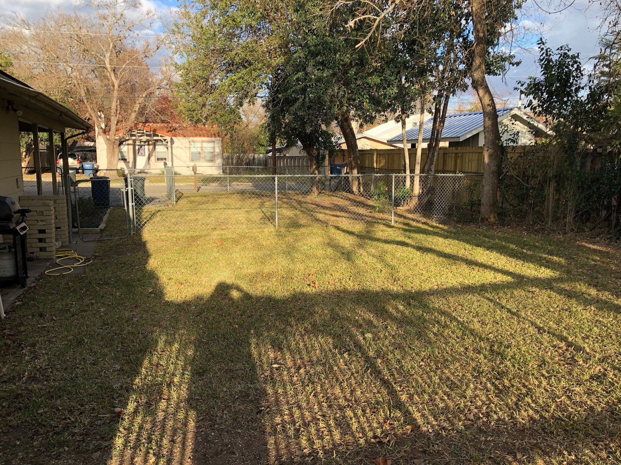 Fenced private side yard each unit separated by fence - 1034 Elizabeth Ave