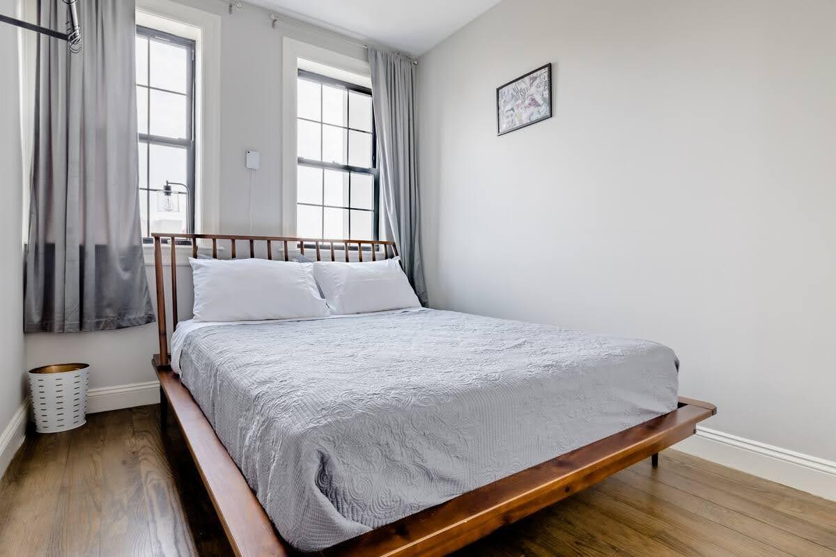 Generous Queen-sized second bedroom, perfect for a premium guest room, nursery, or home office. - 504 Maple St