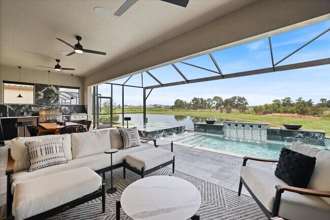 Building Photo - Luxury Home w/ Pool, Outdoor Kitchen, Car Lift, & Water View In Parrish!