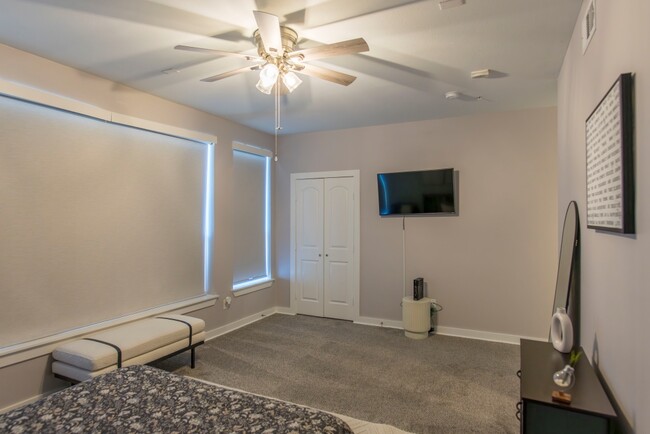 walk in closet in master bedroom - 1211 Beaconsfield Ln