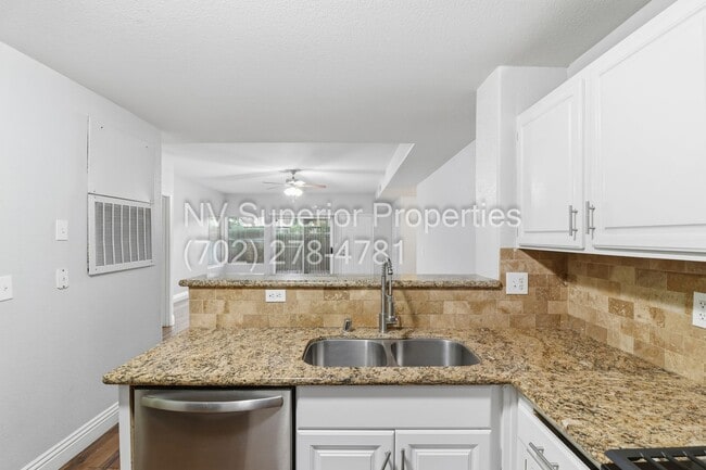 Building Photo - SW!!! 2 Bedroom Condo 1st Floor!! 2 Garage!! Gated!! Community Pool!! Fitness Room!! 2 Primary Be...