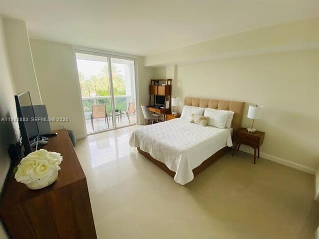 Building Photo - 10275 Collins Ave