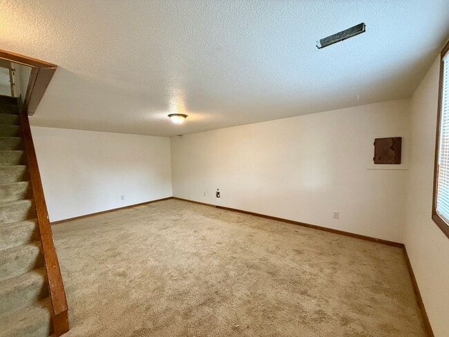 Building Photo - Beautifully Updated 5 Bedroom Rockrimmon Ranch Home Backing to Open Space