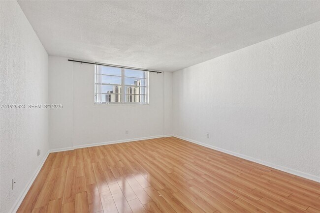 Building Photo - 19390 Collins Ave