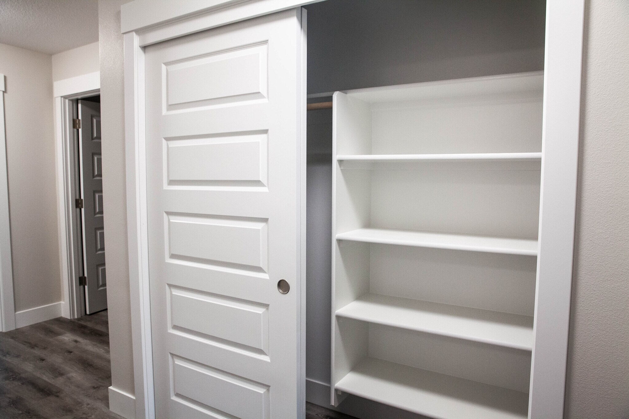Upstairs hallway closet (1 of 2) - 217 Oak St