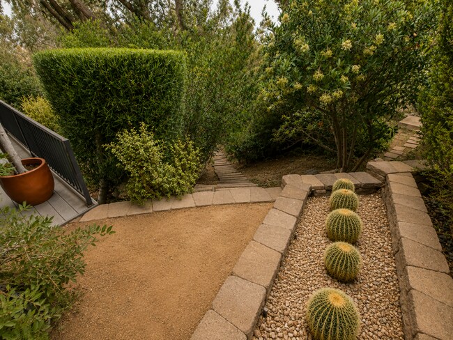 Building Photo - Luxury Hillside Retreat with Expansive Decks, Designer Finishes & Canyon Views