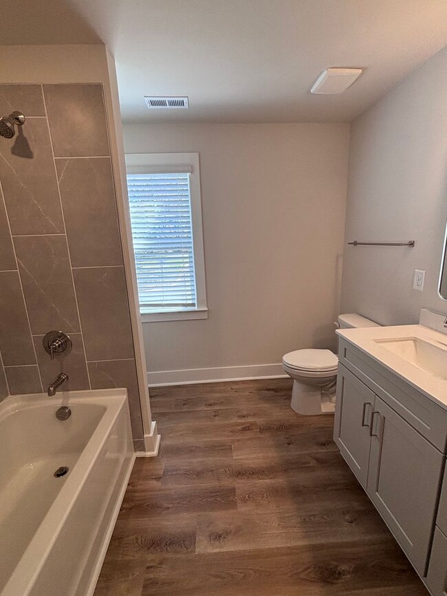 Building Photo - Brand new three-bedroom, 2.5-bath townhome