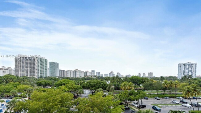 Building Photo - 3701 N Country Club Dr