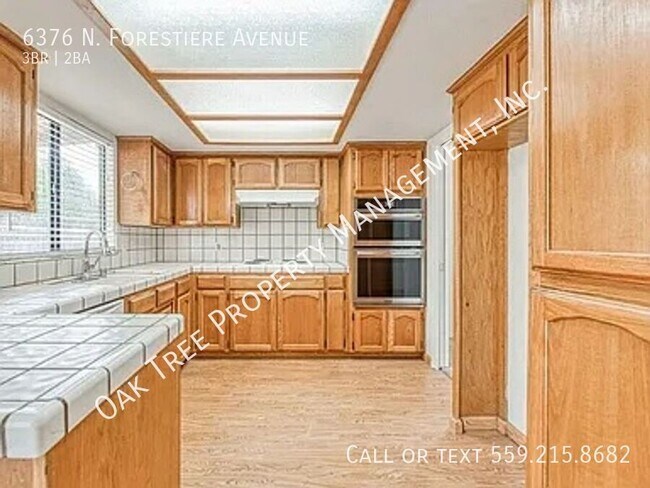 Building Photo - 6376 N Forestiere Ave