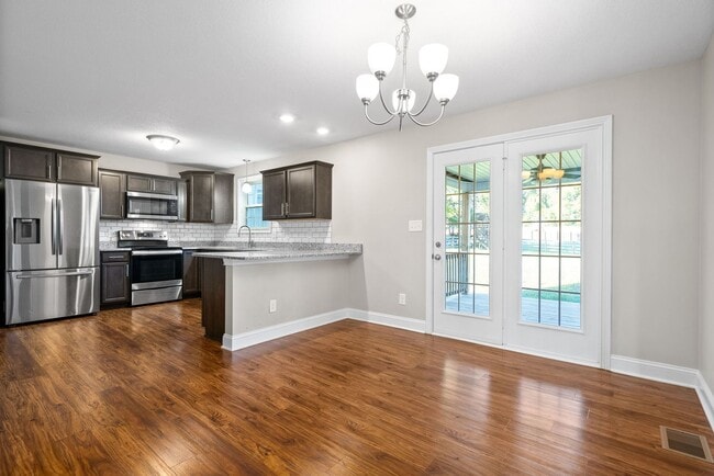 Building Photo - JUST REDUCED! Large, Stunning home ready t...