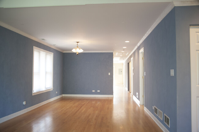 The 16 feet long living room and dining room. - 2112 North Karlov Avenue