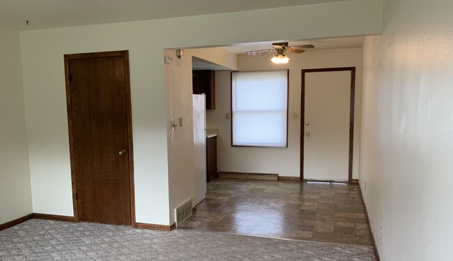 Eat In kitchen, exterior door opens to the private parking lot. - 1320 5th St W