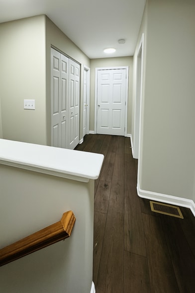 2nd Floor - Linen closet and laundry conveniently across the bedrooms. - 131 Meridian Blvd